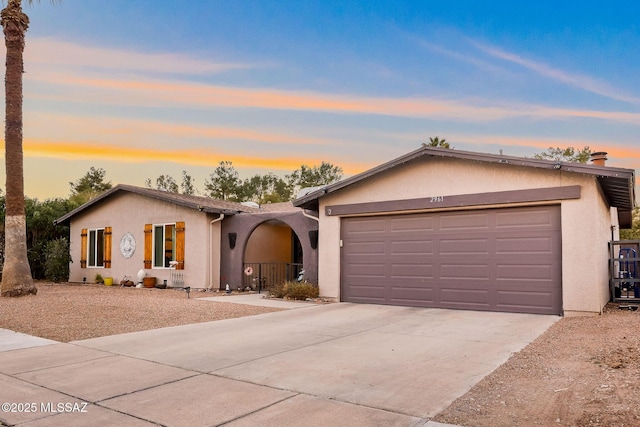 single story home featuring a garage