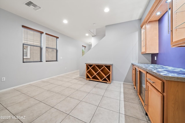 kitchen with light tile patterned floors