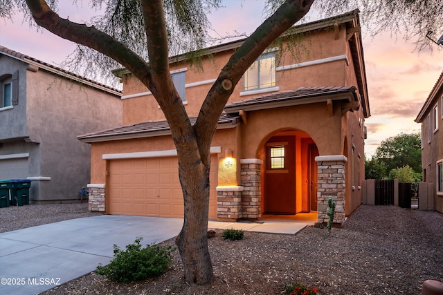 view of front of property with a garage