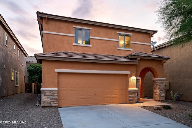 view of front of home with a garage