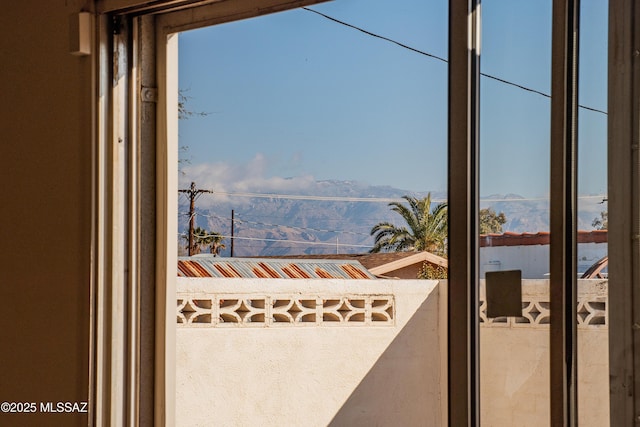 doorway featuring a mountain view