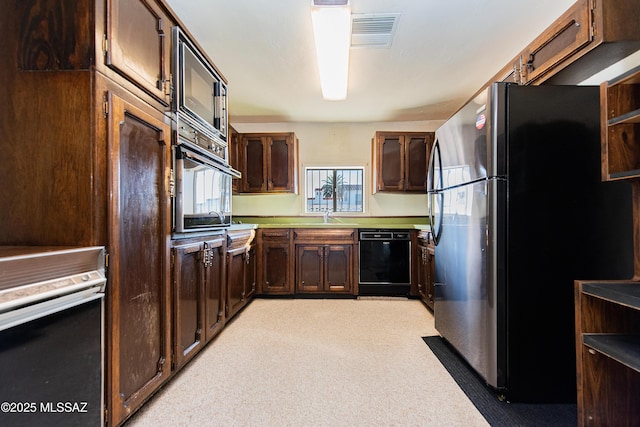 kitchen with sink, stainless steel fridge, dishwasher, wall oven, and built in microwave