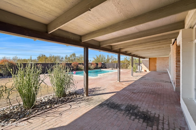 view of patio / terrace featuring a fenced in pool