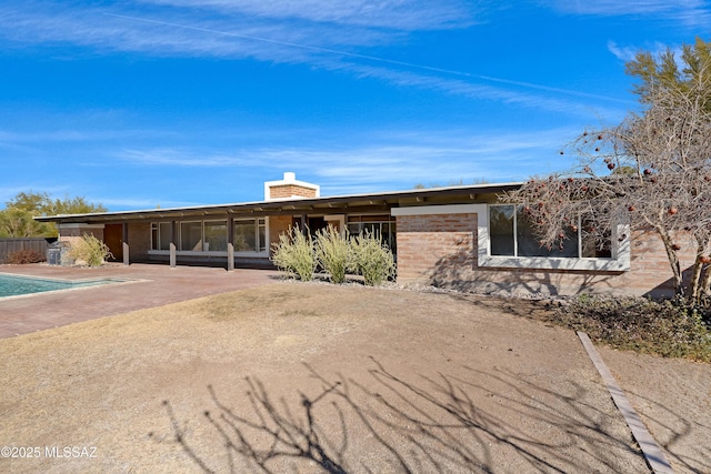 view of front of house featuring a patio