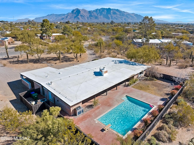 drone / aerial view featuring a mountain view