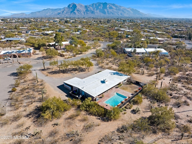 drone / aerial view featuring a mountain view