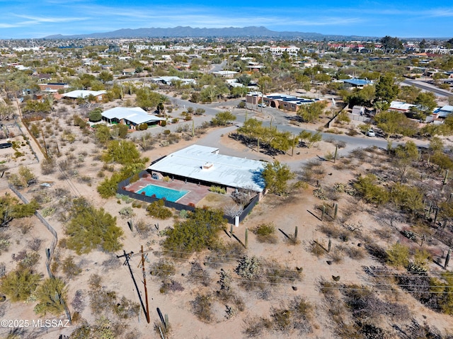 drone / aerial view featuring a mountain view