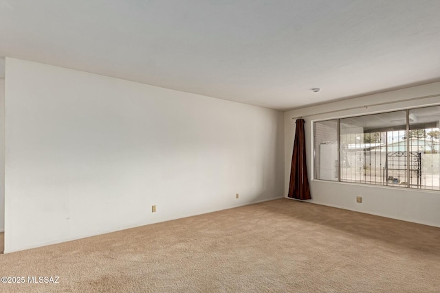 spare room with carpet flooring