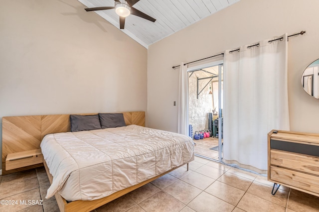 tiled bedroom with ceiling fan, access to exterior, and vaulted ceiling