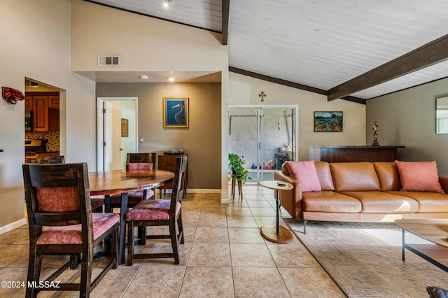 tiled living room featuring lofted ceiling with beams