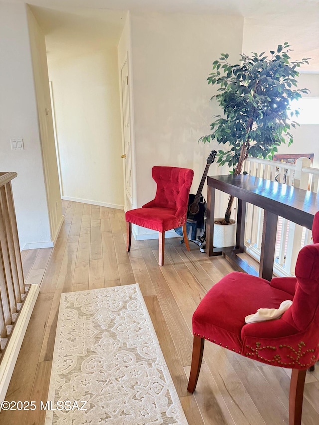 sitting room featuring hardwood / wood-style flooring