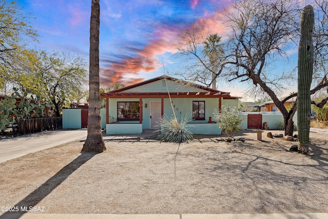 view of front of property featuring covered porch