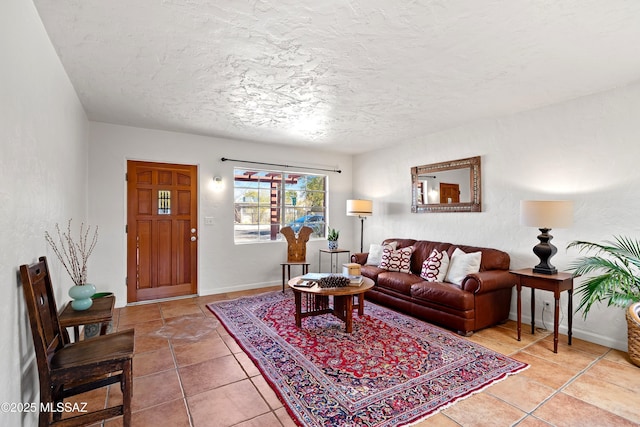 living room featuring tile patterned floors and a textured ceiling