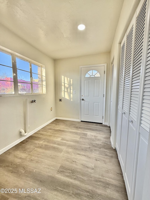 entrance foyer featuring light wood-type flooring