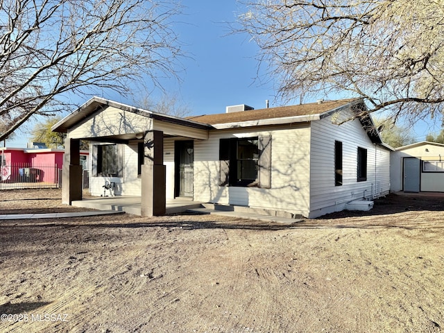 view of front of house with a patio area