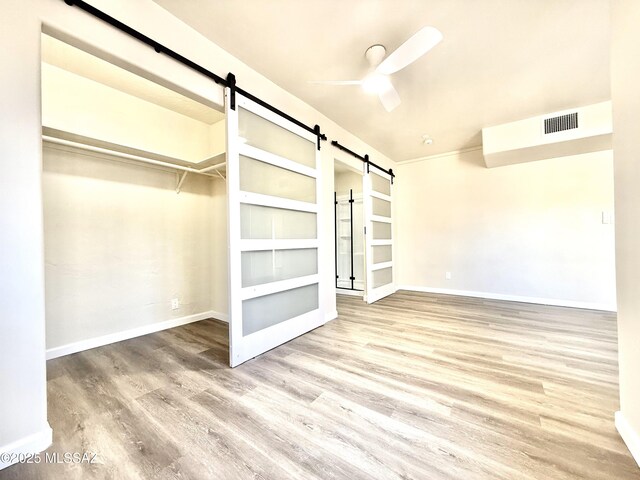 bathroom with vanity, hardwood / wood-style floors, and toilet