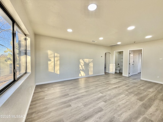 spare room featuring hardwood / wood-style flooring