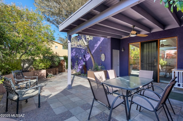 view of patio / terrace featuring ceiling fan