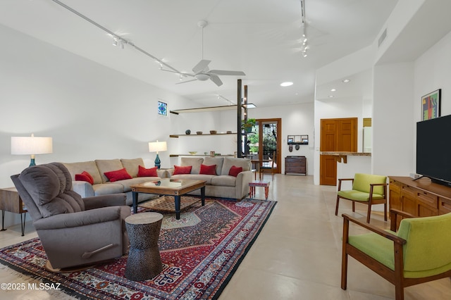 living room with rail lighting and ceiling fan