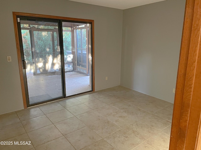 view of tiled spare room