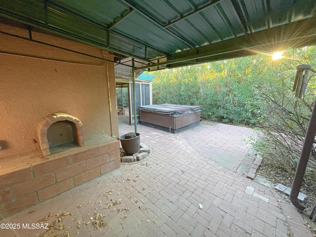 view of patio featuring a hot tub