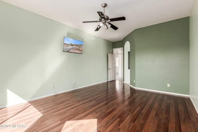 spare room with hardwood / wood-style floors and ceiling fan