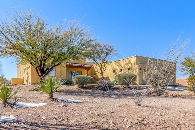 view of adobe home