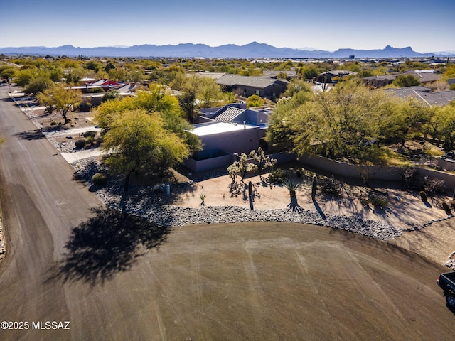 drone / aerial view featuring a mountain view