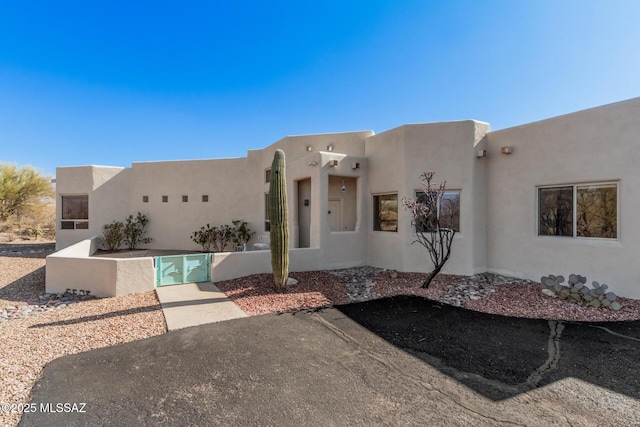 view of adobe home