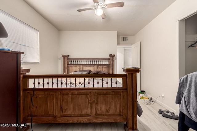 bedroom with hardwood / wood-style floors