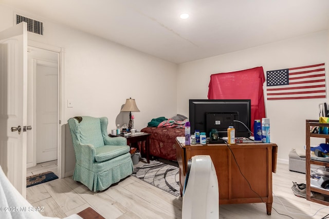 home office featuring light hardwood / wood-style flooring