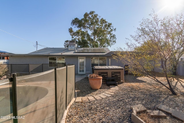 back of property featuring a patio