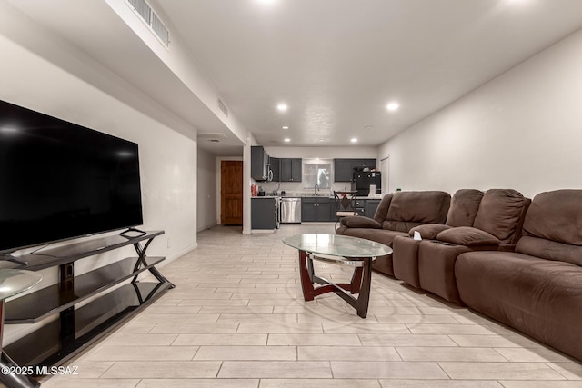 living room with sink