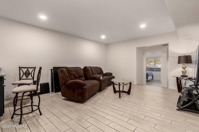 living room with light hardwood / wood-style flooring