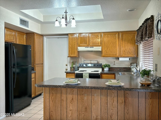 kitchen with light tile patterned flooring, electric range oven, sink, kitchen peninsula, and black fridge