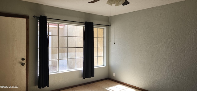 unfurnished room with ceiling fan