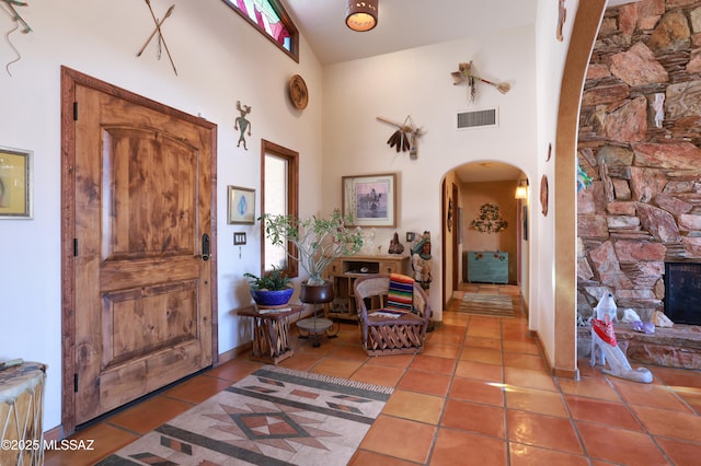 925 N Rancho Del Jefe Loop, Tucson, AZ 85748 - entrance foyer with arched walkways, high vaulted ceiling, tile patterned floors, and baseboards