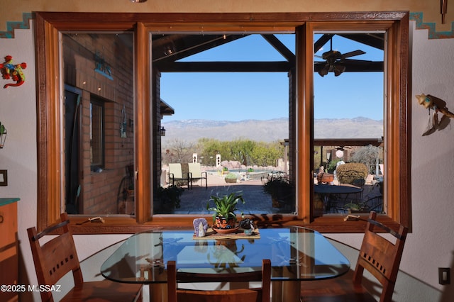 925 N Rancho Del Jefe Loop, Tucson, AZ 85748 - dining space with a mountain view, healthy amount of natural light, ceiling fan, and a textured wall