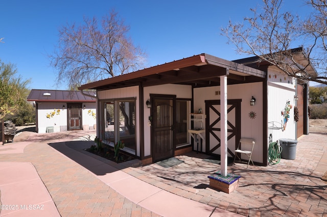 925 N Rancho Del Jefe Loop, Tucson, AZ 85748 - rear view of house featuring metal roof