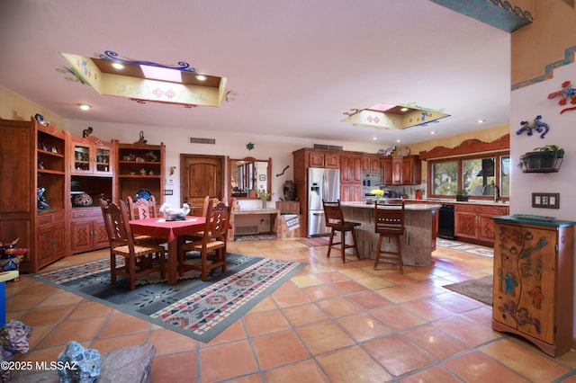 925 N Rancho Del Jefe Loop, Tucson, AZ 85748 - dining room with light tile patterned floors and recessed lighting