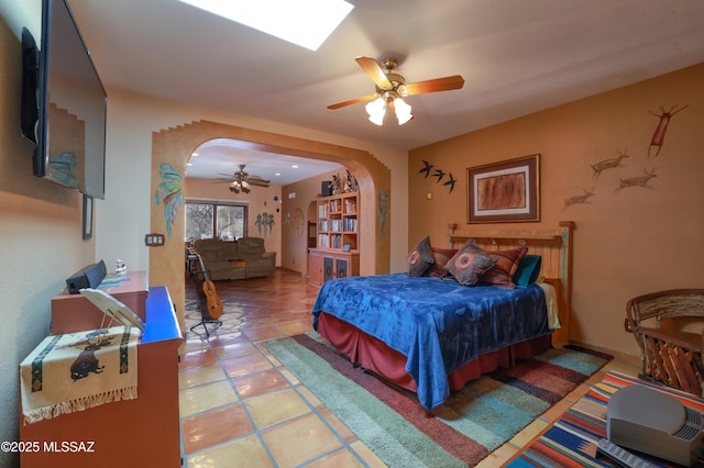 925 N Rancho Del Jefe Loop, Tucson, AZ 85748 - bedroom with arched walkways and ceiling fan
