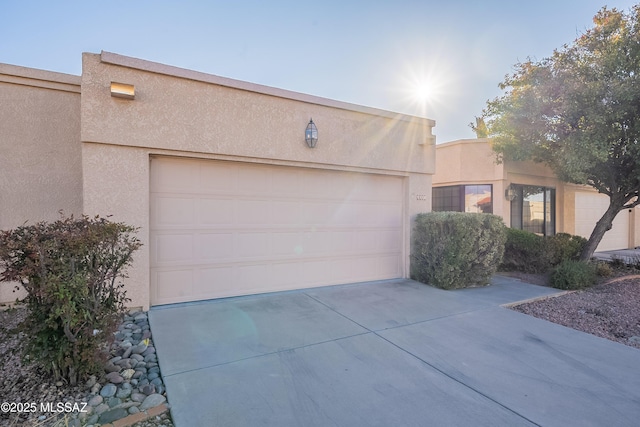 southwest-style home with a garage