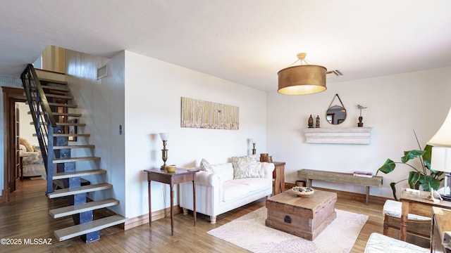 living room featuring dark hardwood / wood-style floors