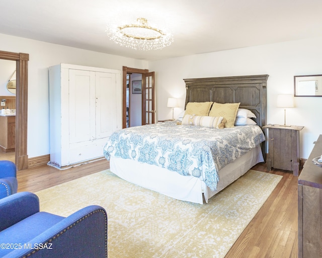 bedroom featuring light wood-type flooring