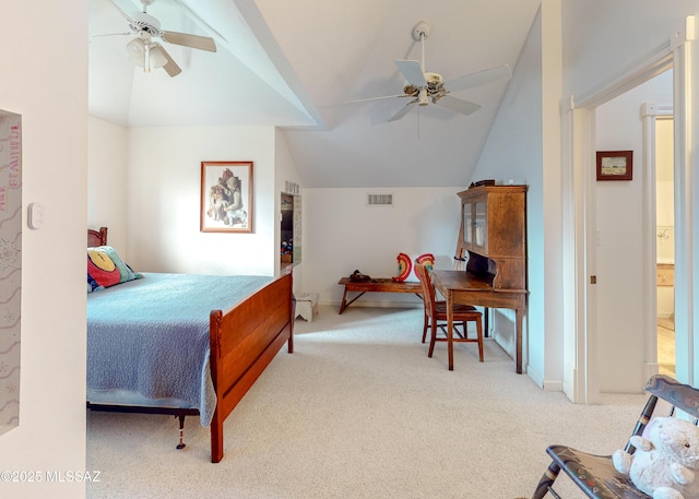 carpeted bedroom featuring ceiling fan and vaulted ceiling