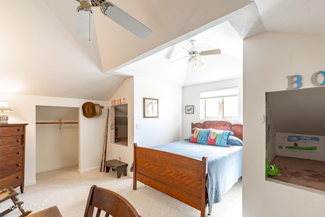 bedroom featuring vaulted ceiling, light colored carpet, and ceiling fan