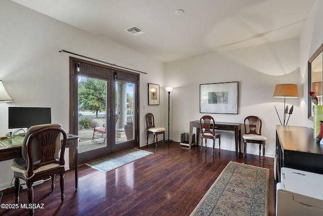 entrance foyer featuring visible vents, baseboards, french doors, and wood finished floors