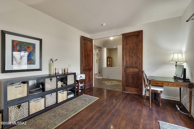 office space with baseboards and hardwood / wood-style floors