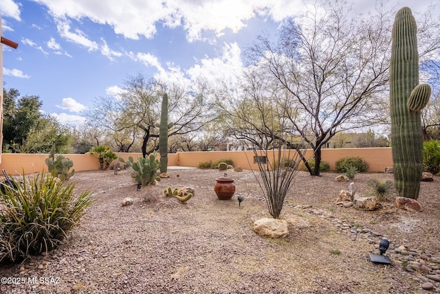 view of yard featuring a fenced backyard