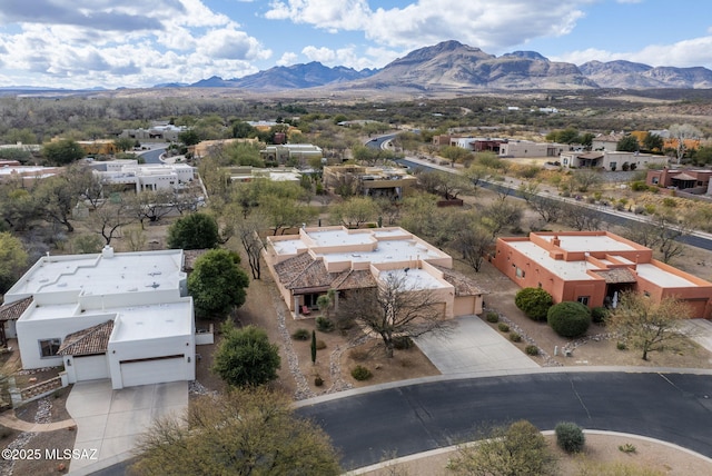 drone / aerial view with a mountain view and a residential view